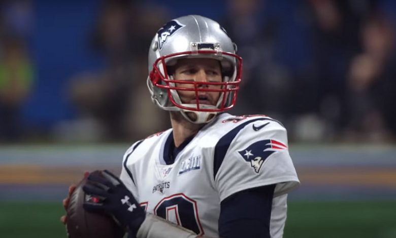 Quaterback Tom Brady getting ready to throw